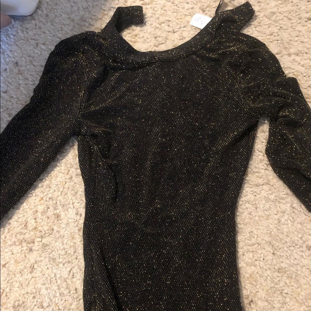 Black, backless sparkle bodysuit